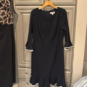 Size 12 navy blue with white piping by Nanette.